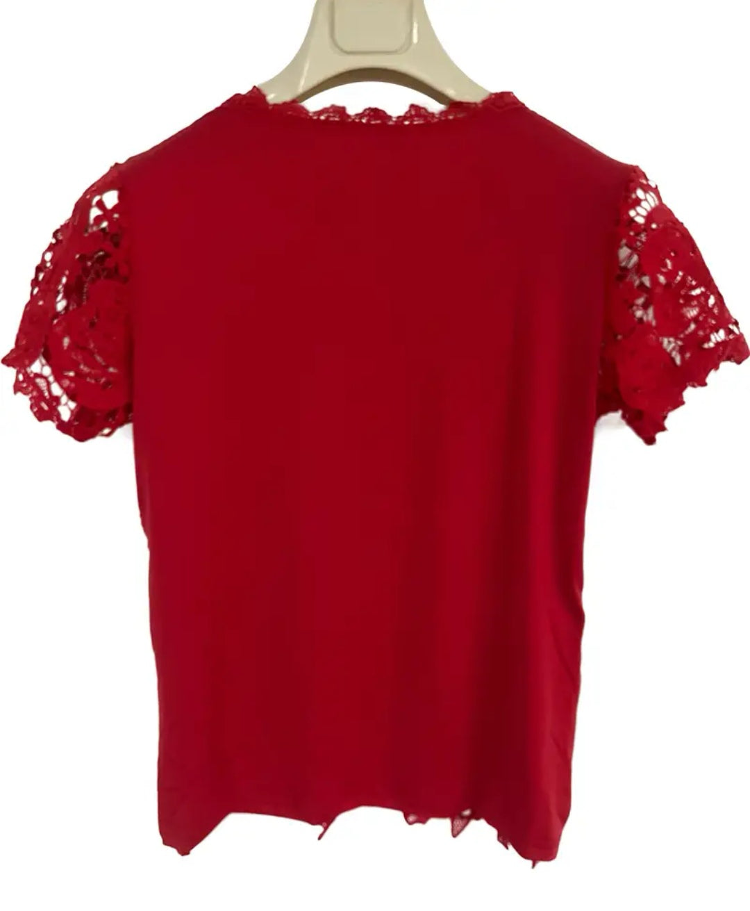 Shorter lace crew neck blouse